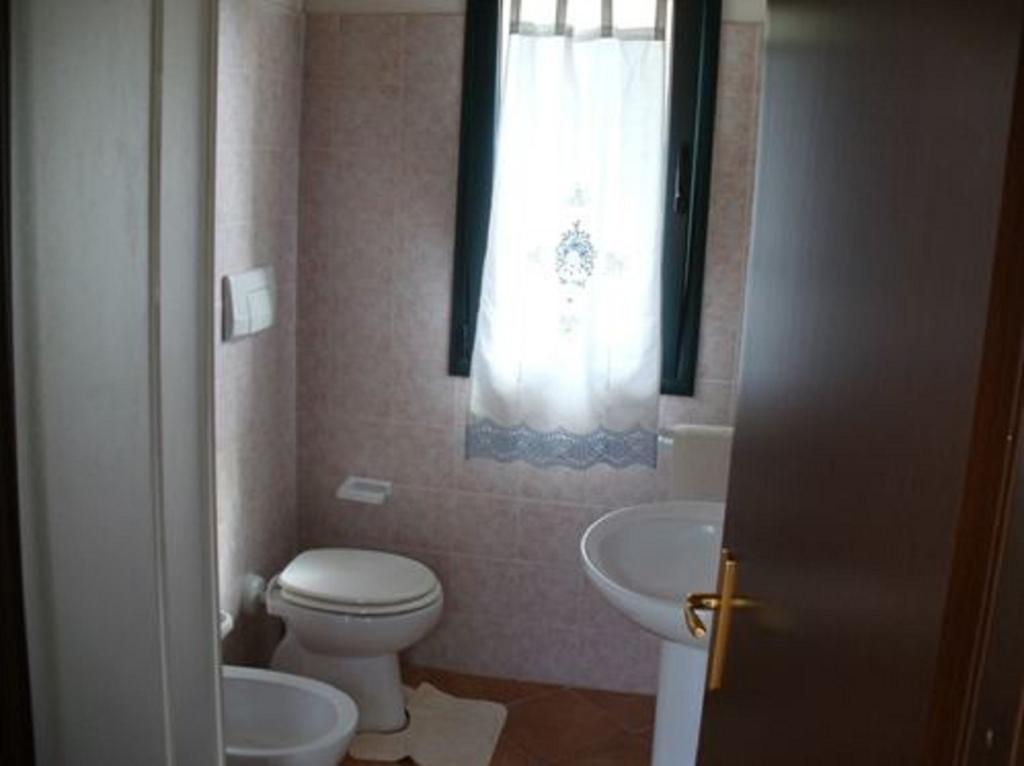 Farm Stay Gli Oleandri Loiri Porto San Paolo Szoba fotó